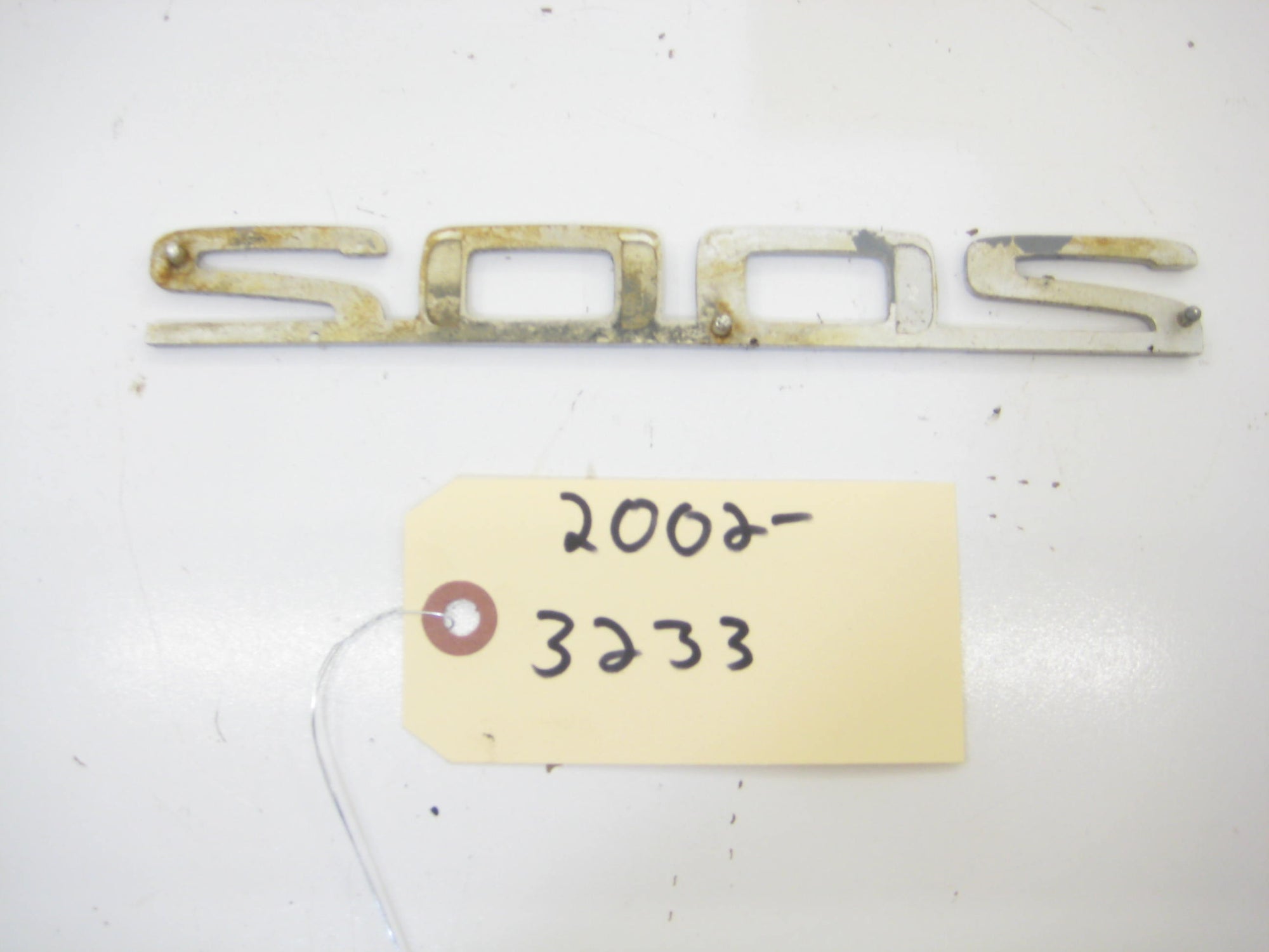 2002 Trunk Script Badge