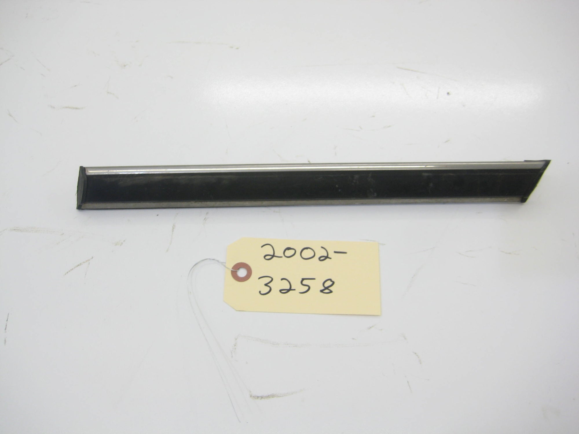 Right Rear Passenger Quarter Bump Trim Behind Tire