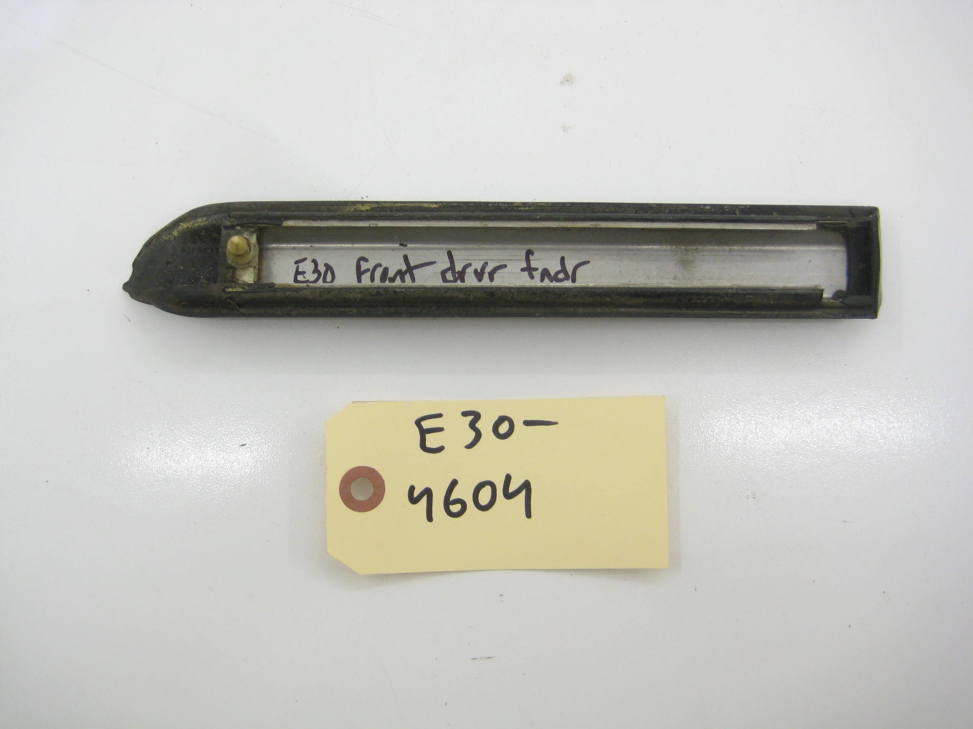 Left Driver Front Fender Bump Trim (Early)