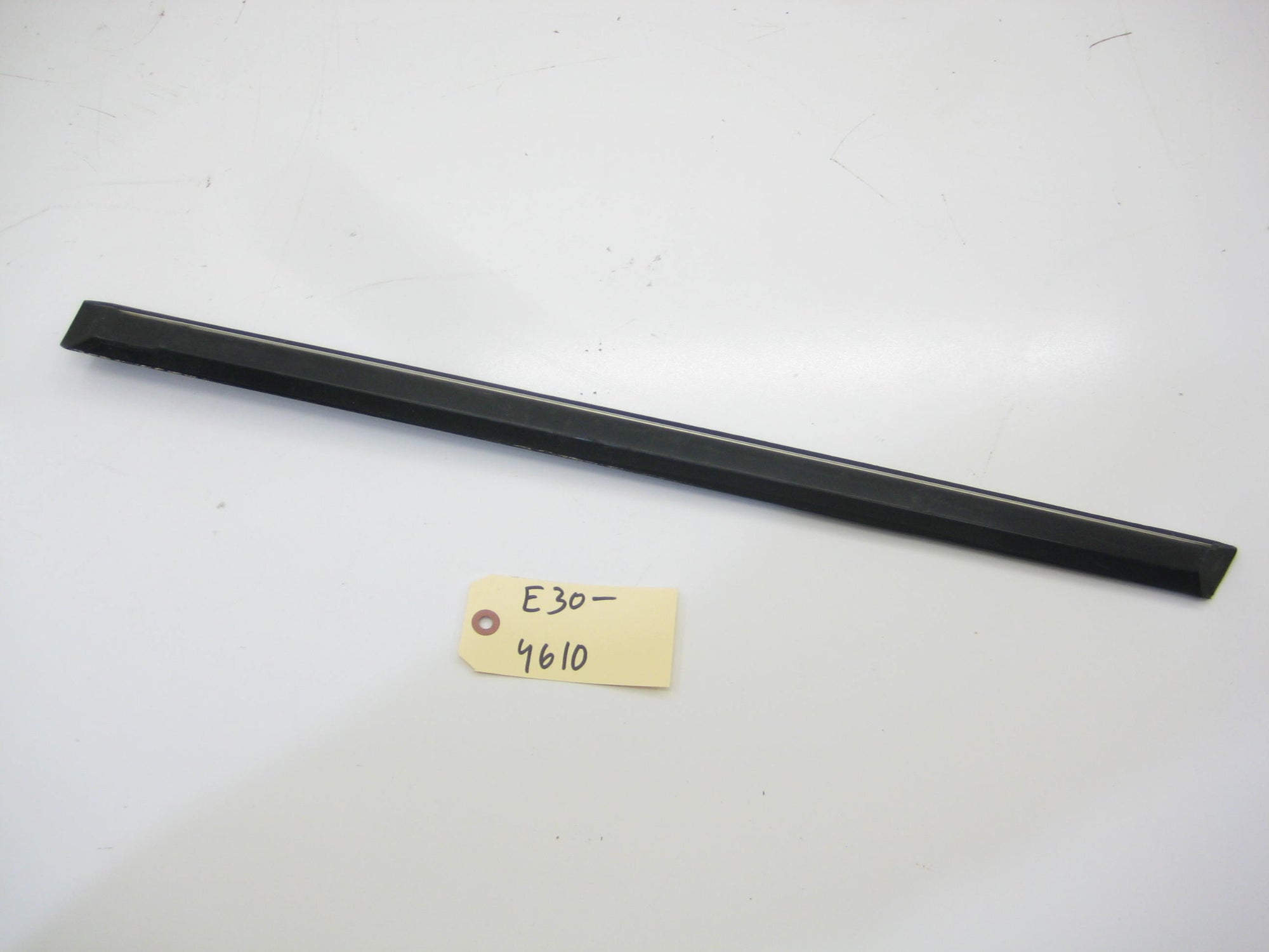 Sedan Rear Left Driver Bump Trim (Early)