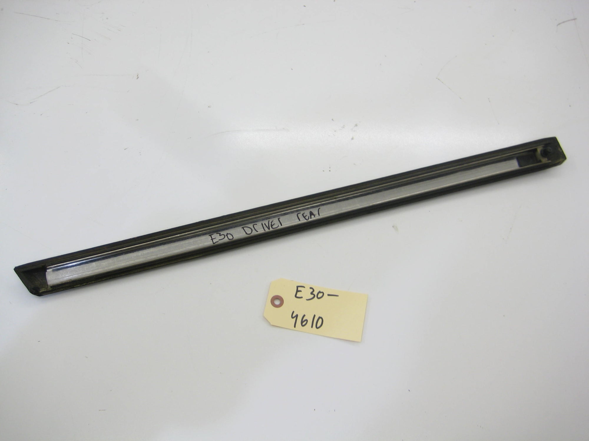 Sedan Rear Left Driver Bump Trim (Early)