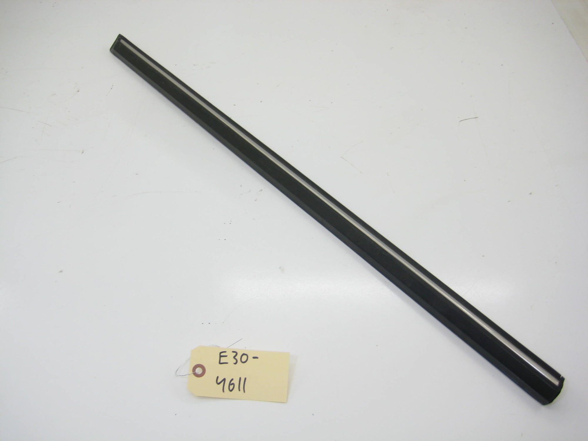 Sedan Front Left Driver Bump Trim (Early)