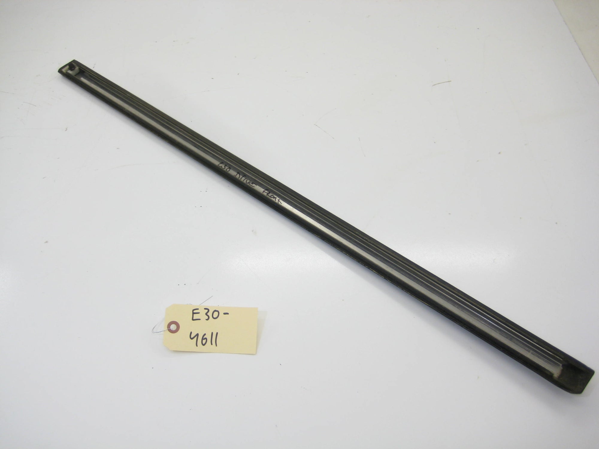 Sedan Front Left Driver Bump Trim (Early)