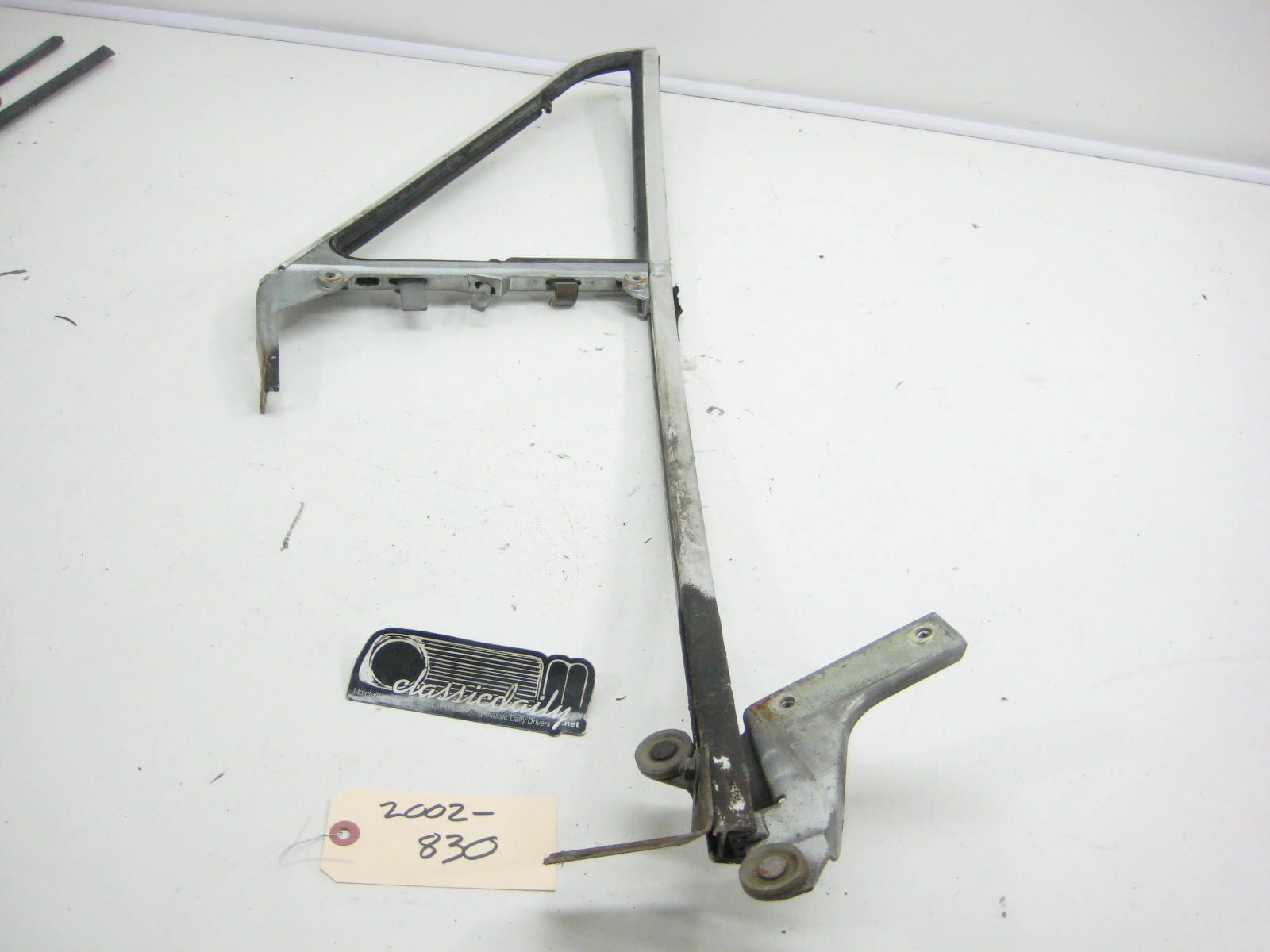 bmw 2002 2002tii e10 driver side front flip out window frame