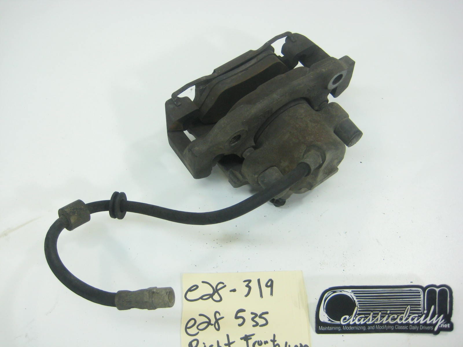 bmw 535 right front brake caliper