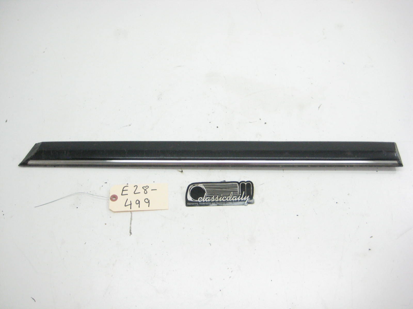 bmw e28 535 535is 528e drivers side rear door bump trim