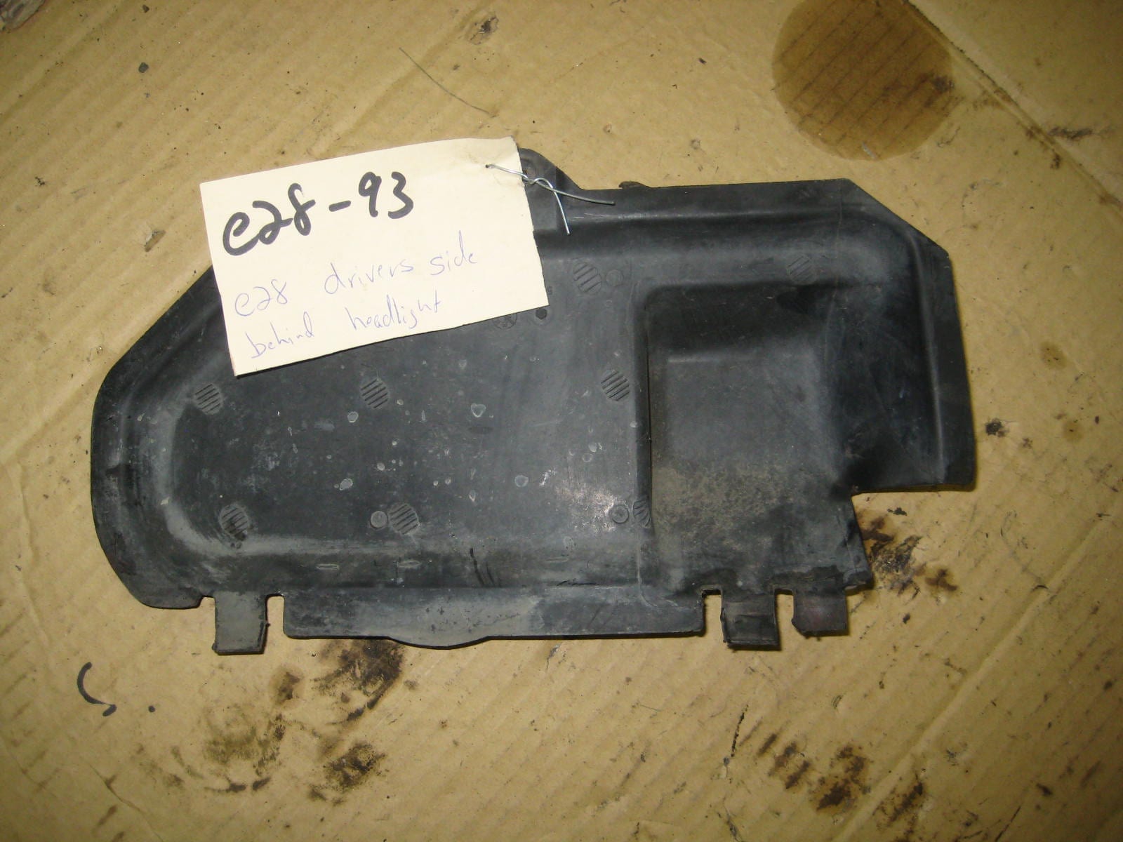 e28 drivers side panel behind headlight