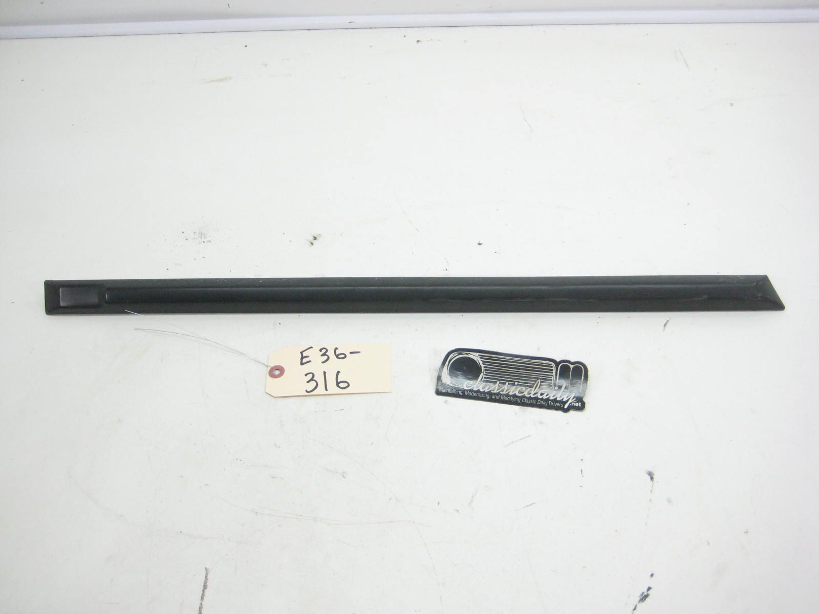 bmw e36 325 328 m3 rear seadan passenger lower bump trim