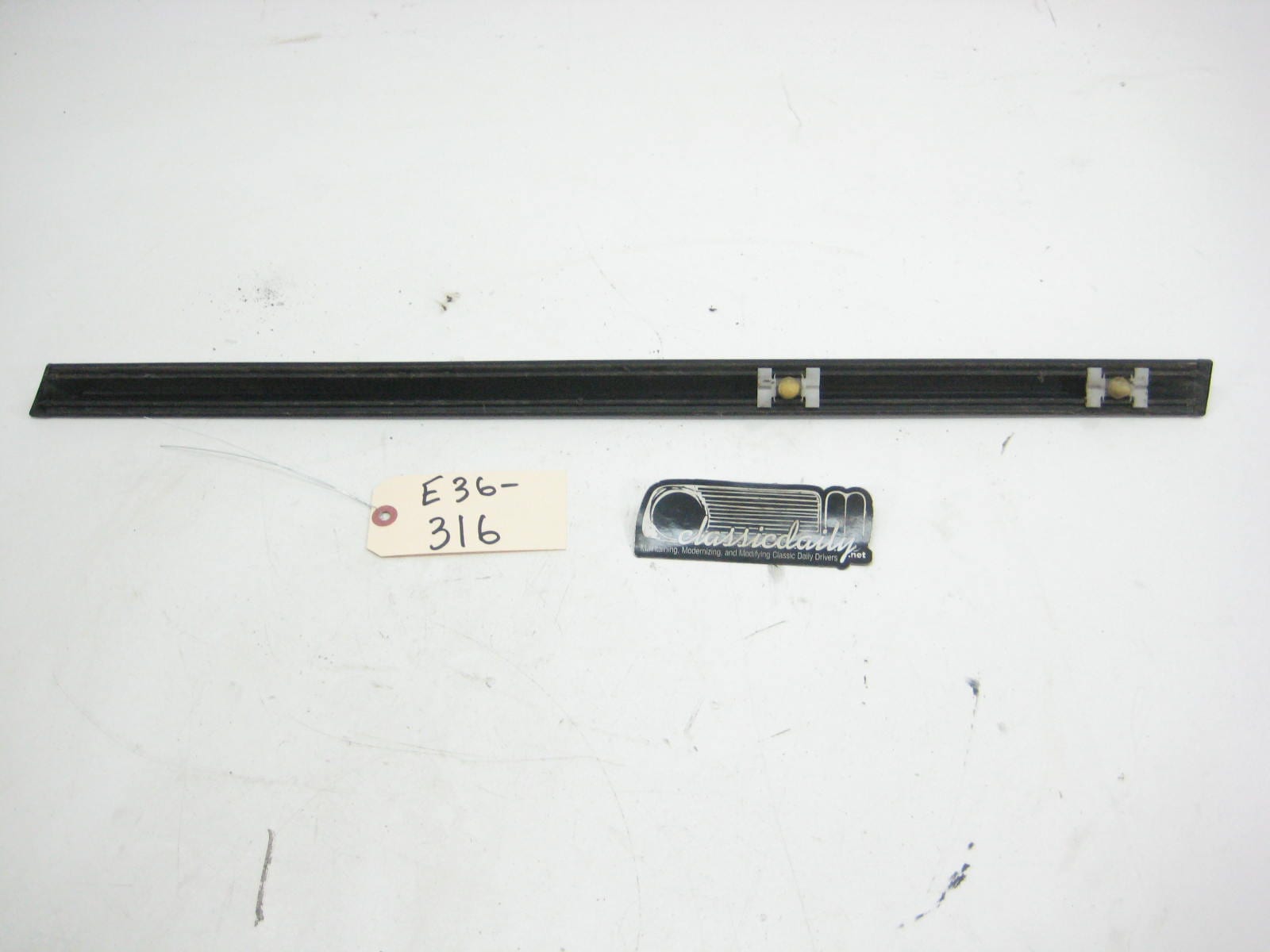 bmw e36 325 328 m3 rear seadan passenger lower bump trim