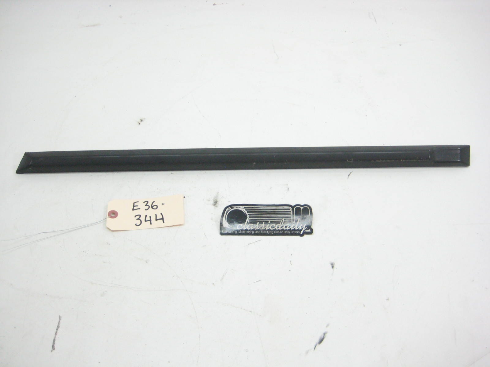 bmw e36 325 328 m3 rear sedan driver lower bump trim