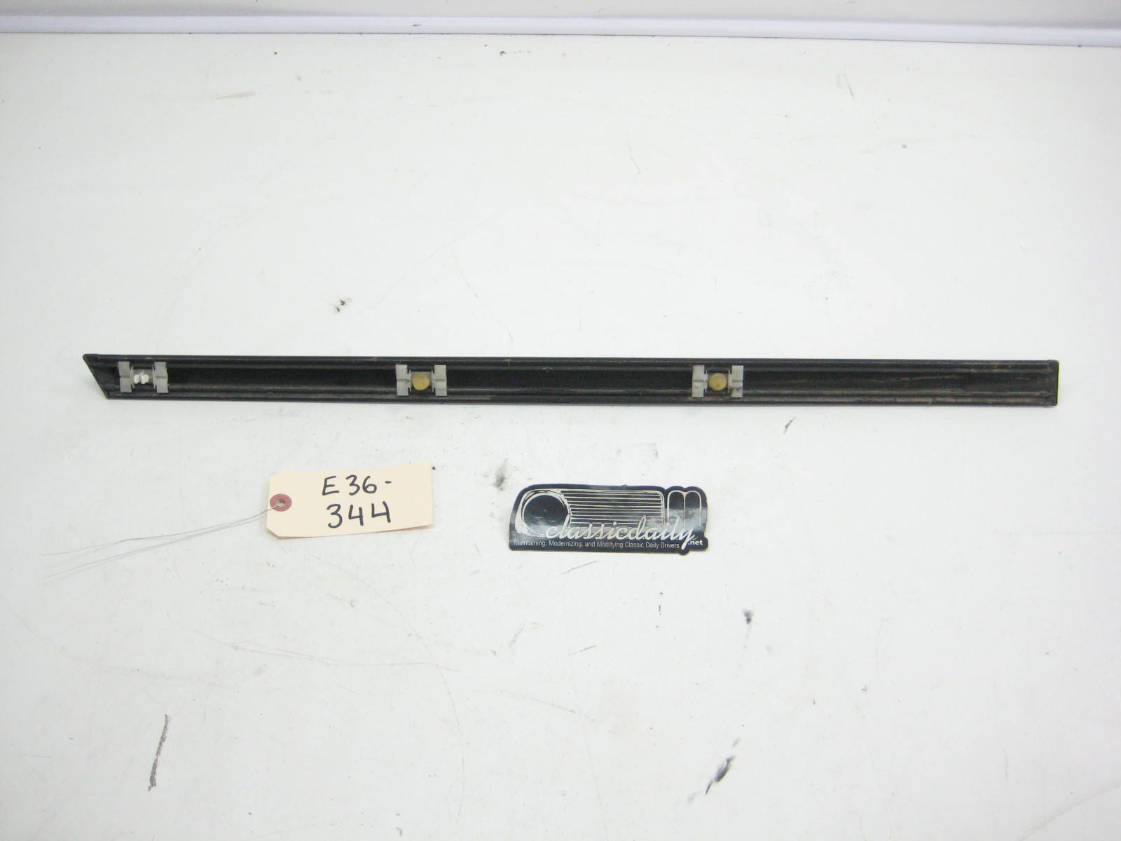 bmw e36 325 328 m3 rear sedan driver lower bump trim